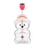 A clear Starbucks bear-shaped cup with a pink straw, topped with a pink strawberry cap featuring the Starbucks logo.