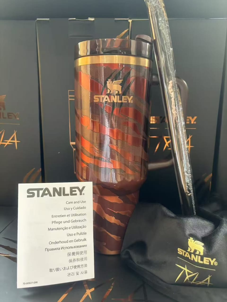 Stanley brown copper patterned insulated tumbler with handle and straw Main image
