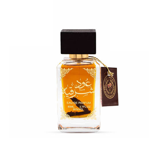 Perfume bottle with Arabic text on a white background