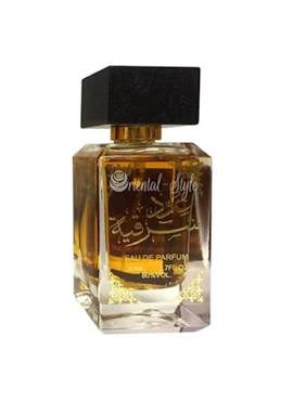 A rectangular glass perfume bottle filled with amber-colored fragrance, featuring a black cap and Arabic script on the front, set against a plain white background.